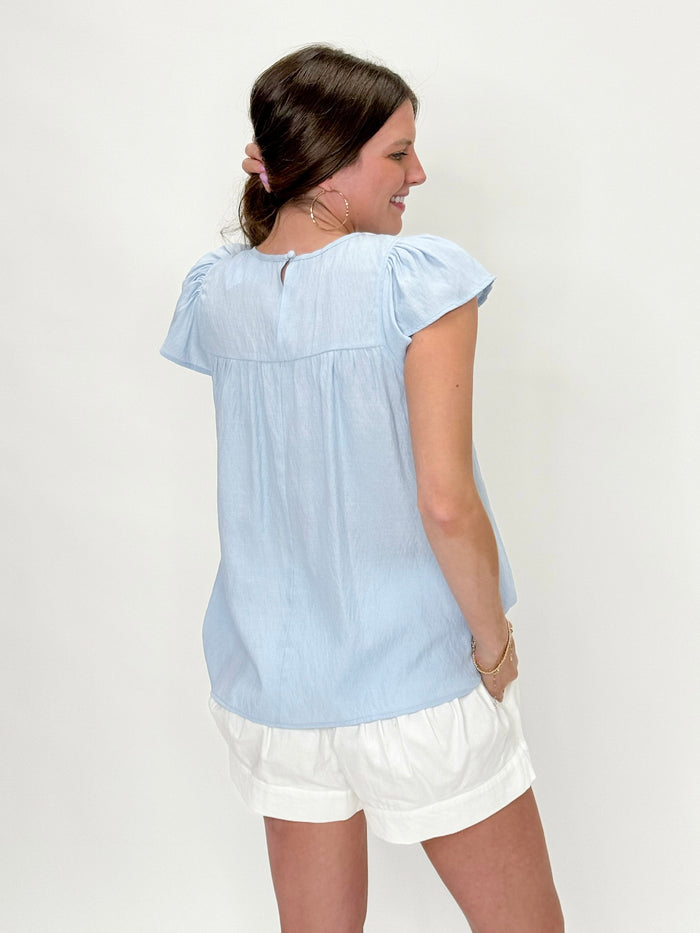 Powder Sky Smocked Flutter Top