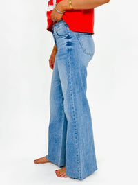 Risen Medium Wash Raw Hem Pallazo Jeans