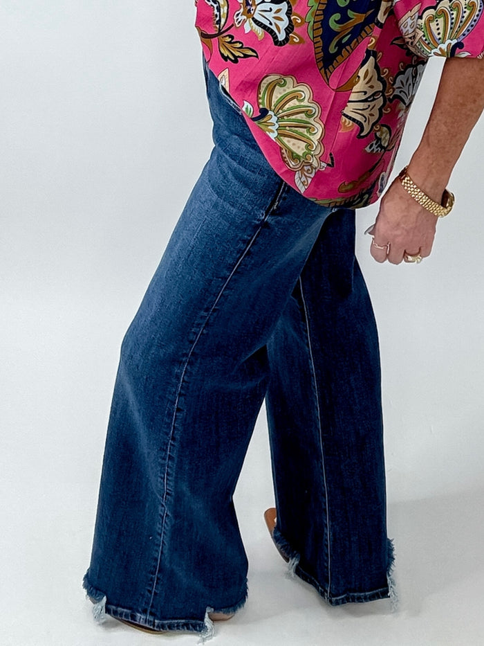 Risen Mid Rise Wide Leg Dark Wash Jeans with Raw Edge Hem