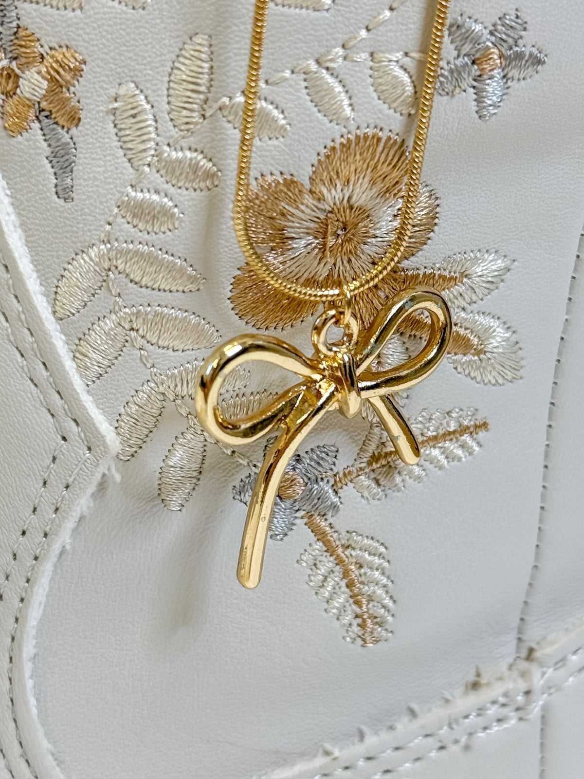 Dorothy Golden Bow Charm Necklace
