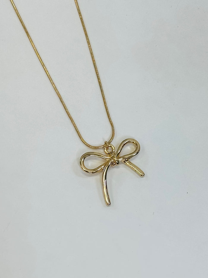 Dorothy Golden Bow Charm Necklace