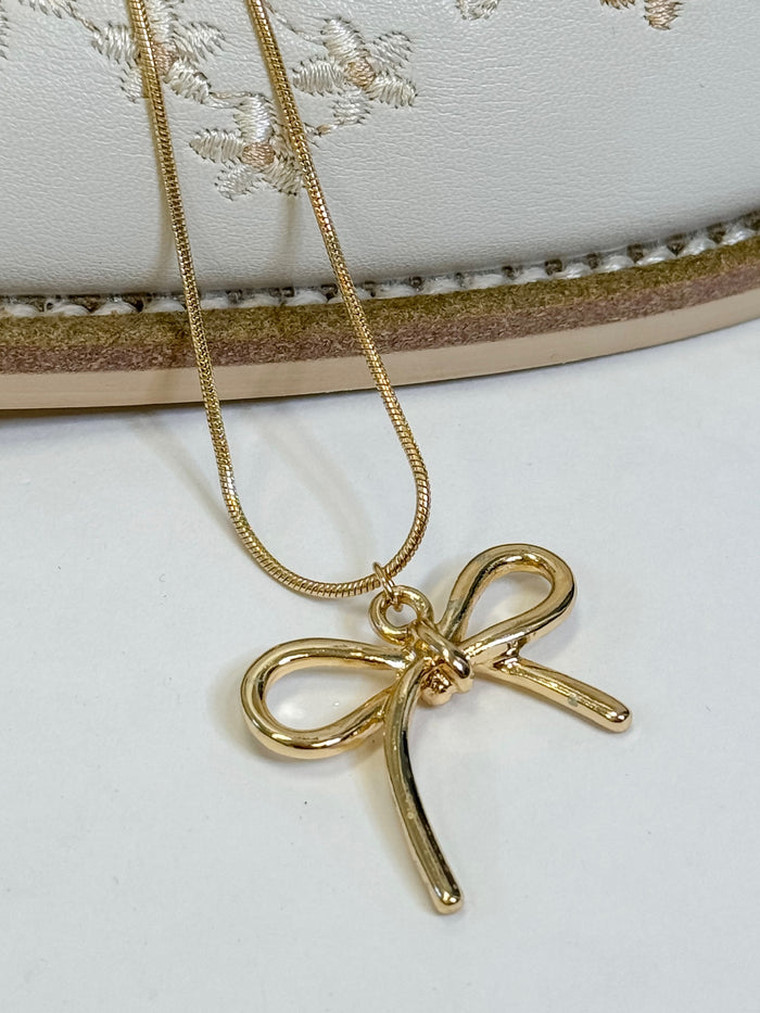 Dorothy Golden Bow Charm Necklace